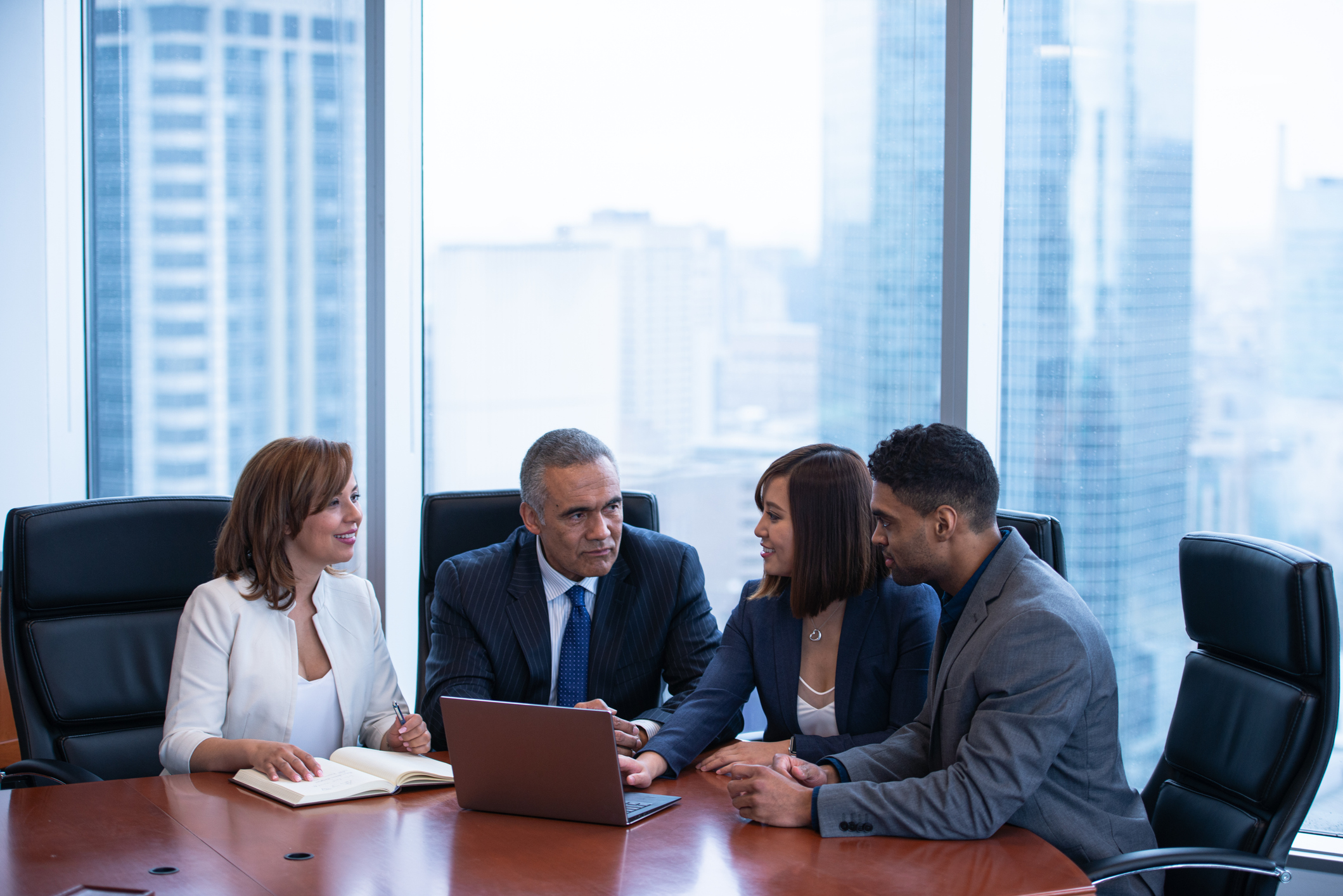 Legal team collaborating around a conference table