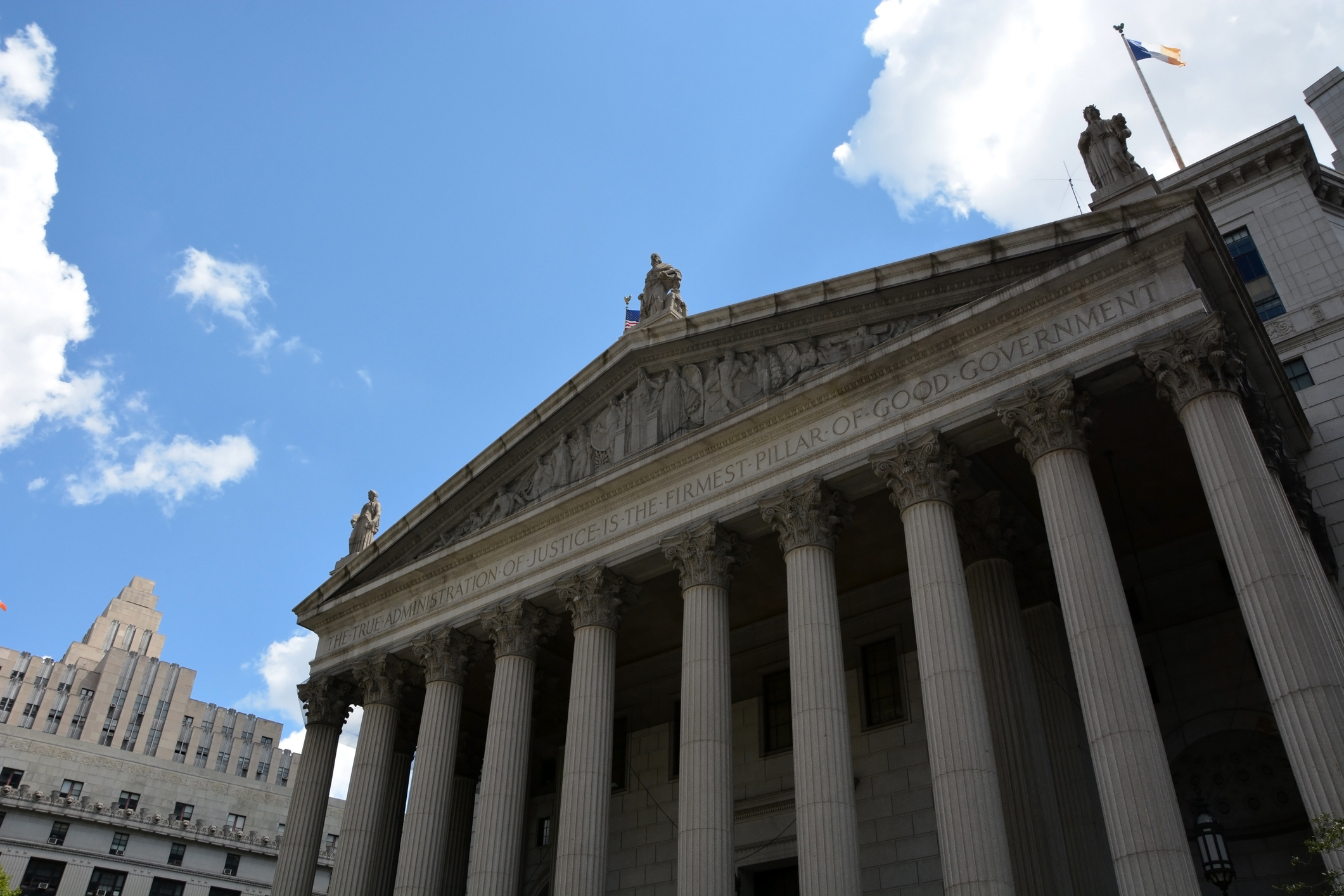 New York Supreme Court courthouse with classical columns and pediment